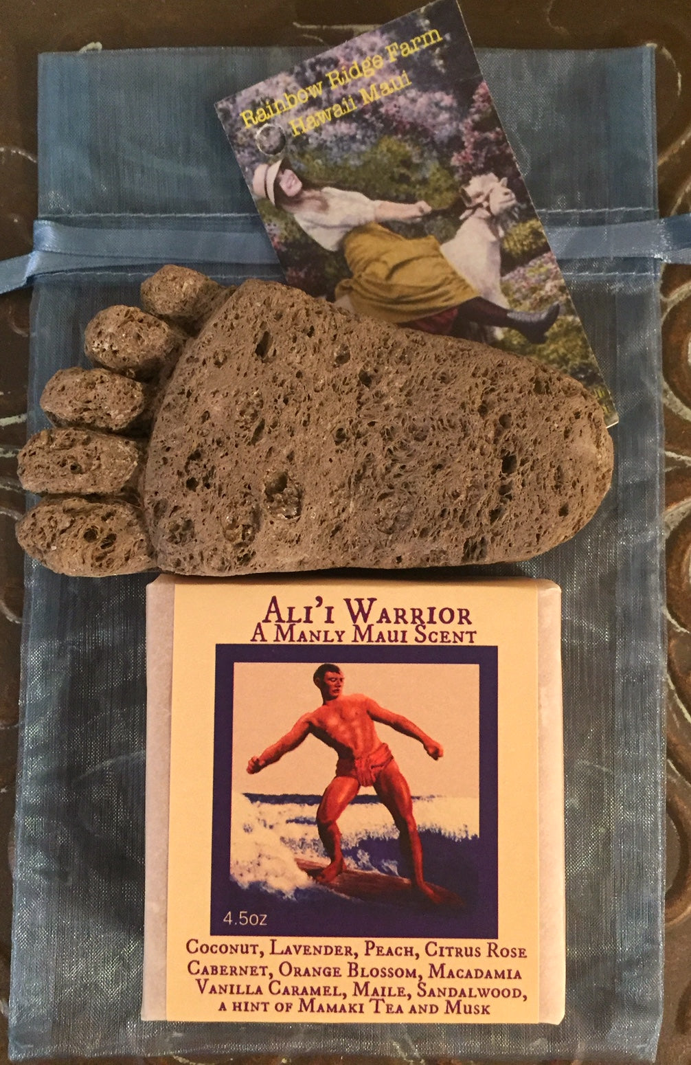 Ali'i Warrior Goat Milk Soap with a Hand-Craved Pumice Foot in an Organza Bag.